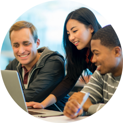 Two young men and a woman looking at a computer